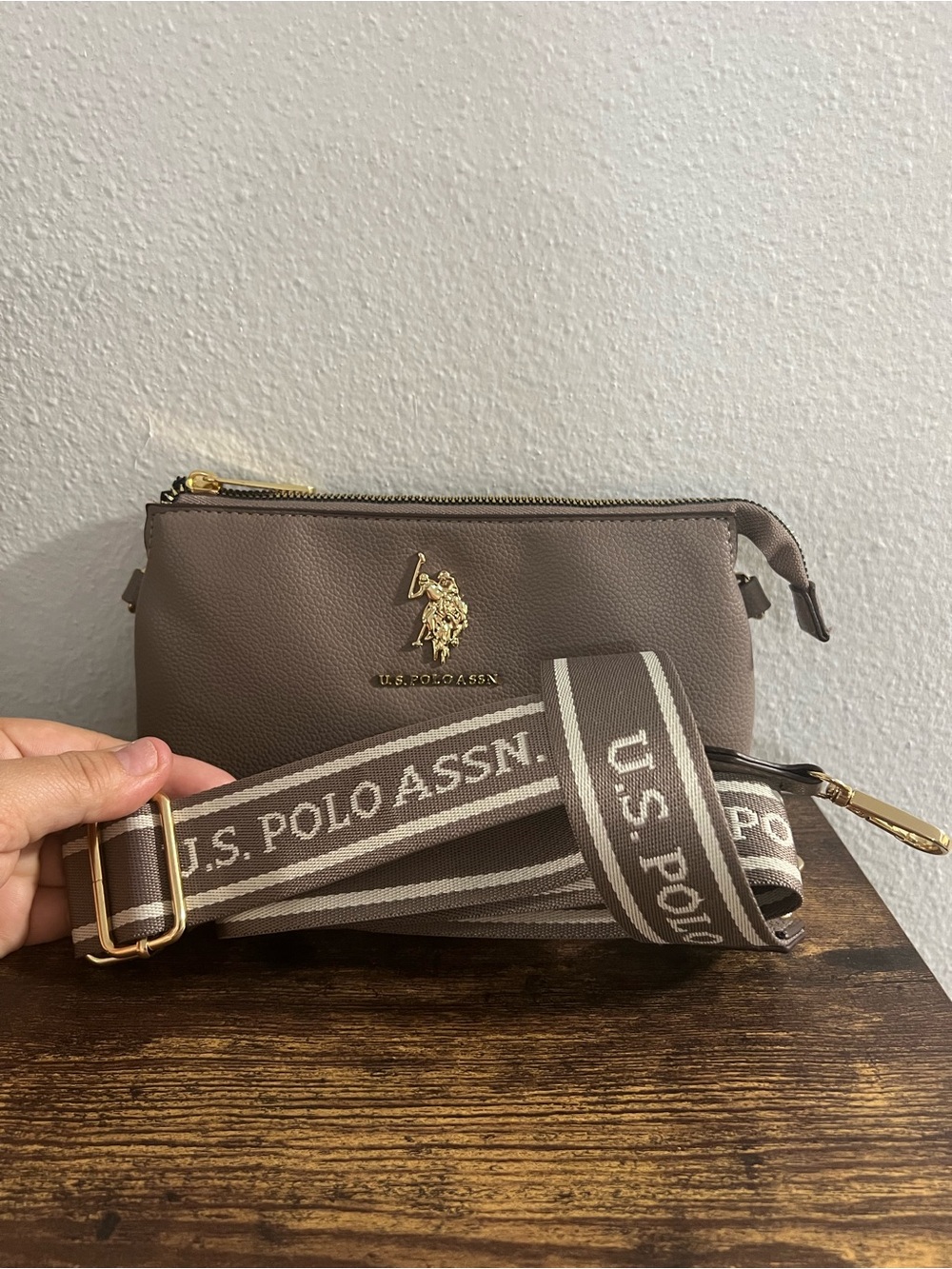 U.S. Polo Assn. Taupe Crossbody Bag Gold Logo Wide Logo Strap